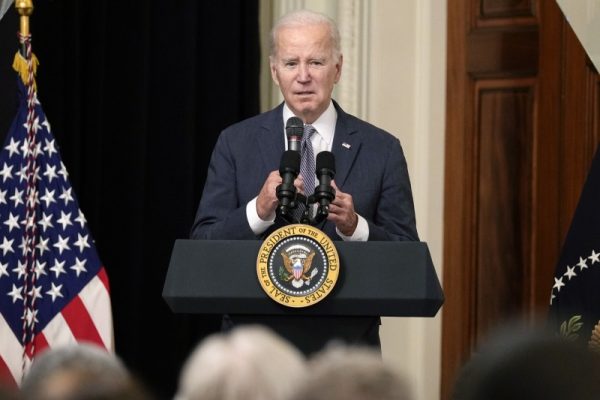 President Joe Biden speaks before the screening of the movie 