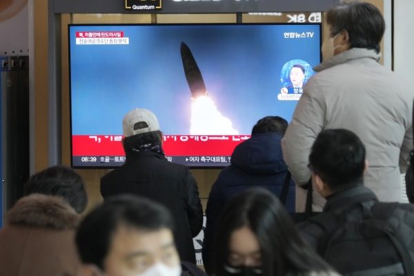 A TV screen shows a file image of North Korea's missile launch during a news program at the Seoul Railway Station in Seoul, South Korea, Monday, Feb. 20, 2023. North Korea has fired a pair of short-range ballistic missiles off its east coast on Monday, South Korea's military said, two days after the North resumed testing activities with an intercontinental ballistic missile launch. (AP Photo/Ahn Young-joon)