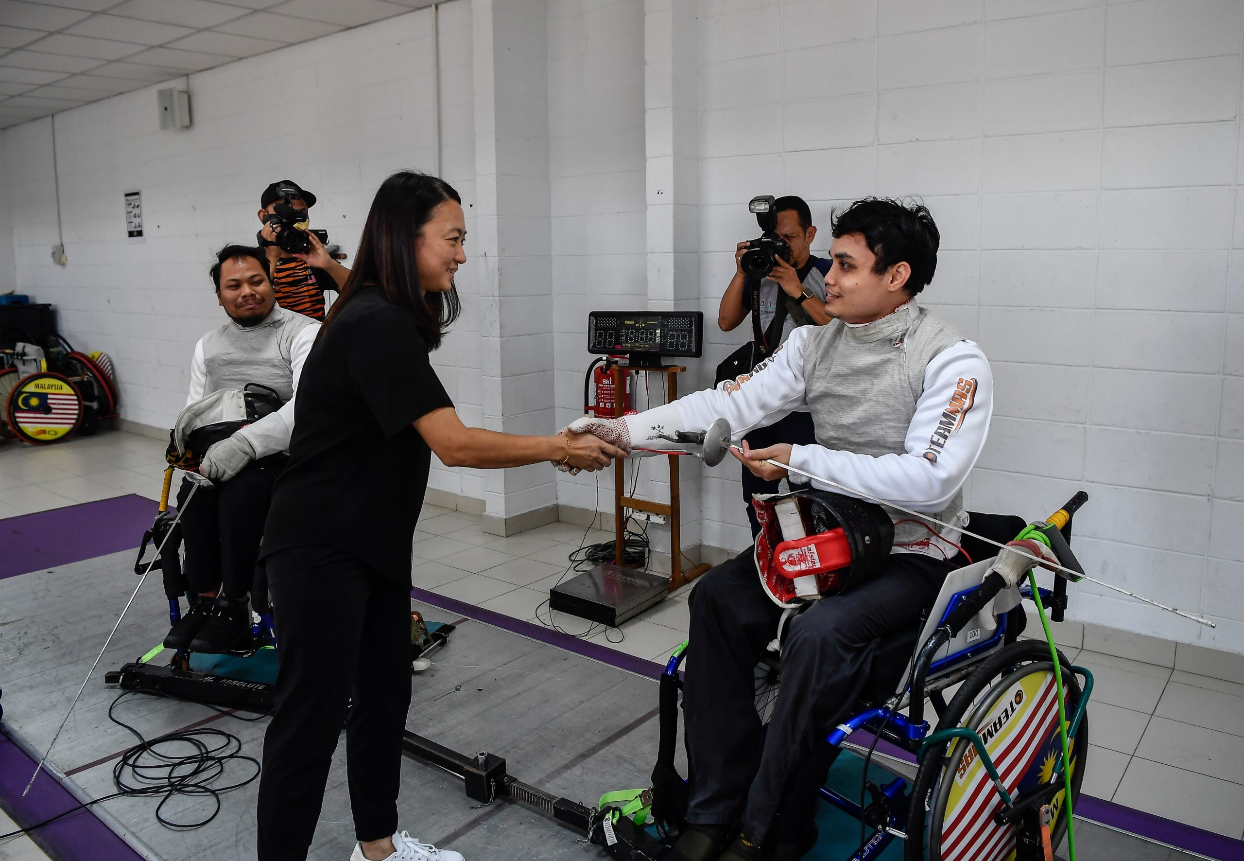 所有残障选手出国比赛  青体部：必须职员陪同