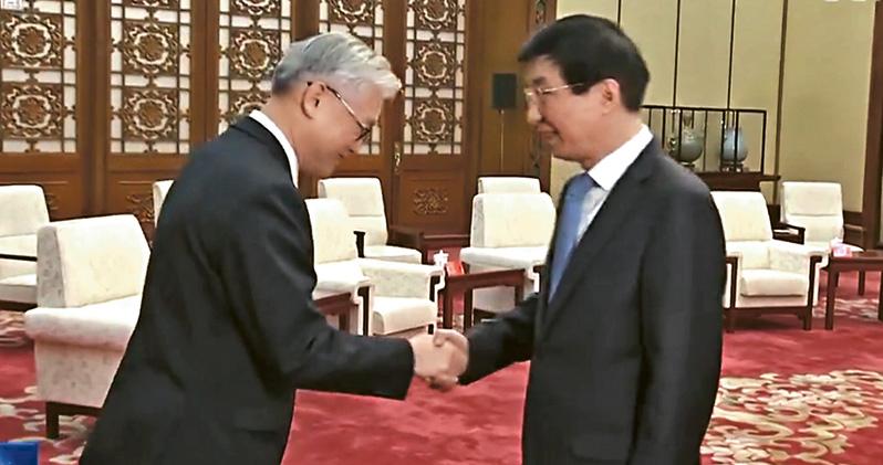 接见夏立言促巩固“九二共识” 王沪宁:当务恢复两岸交流正常化