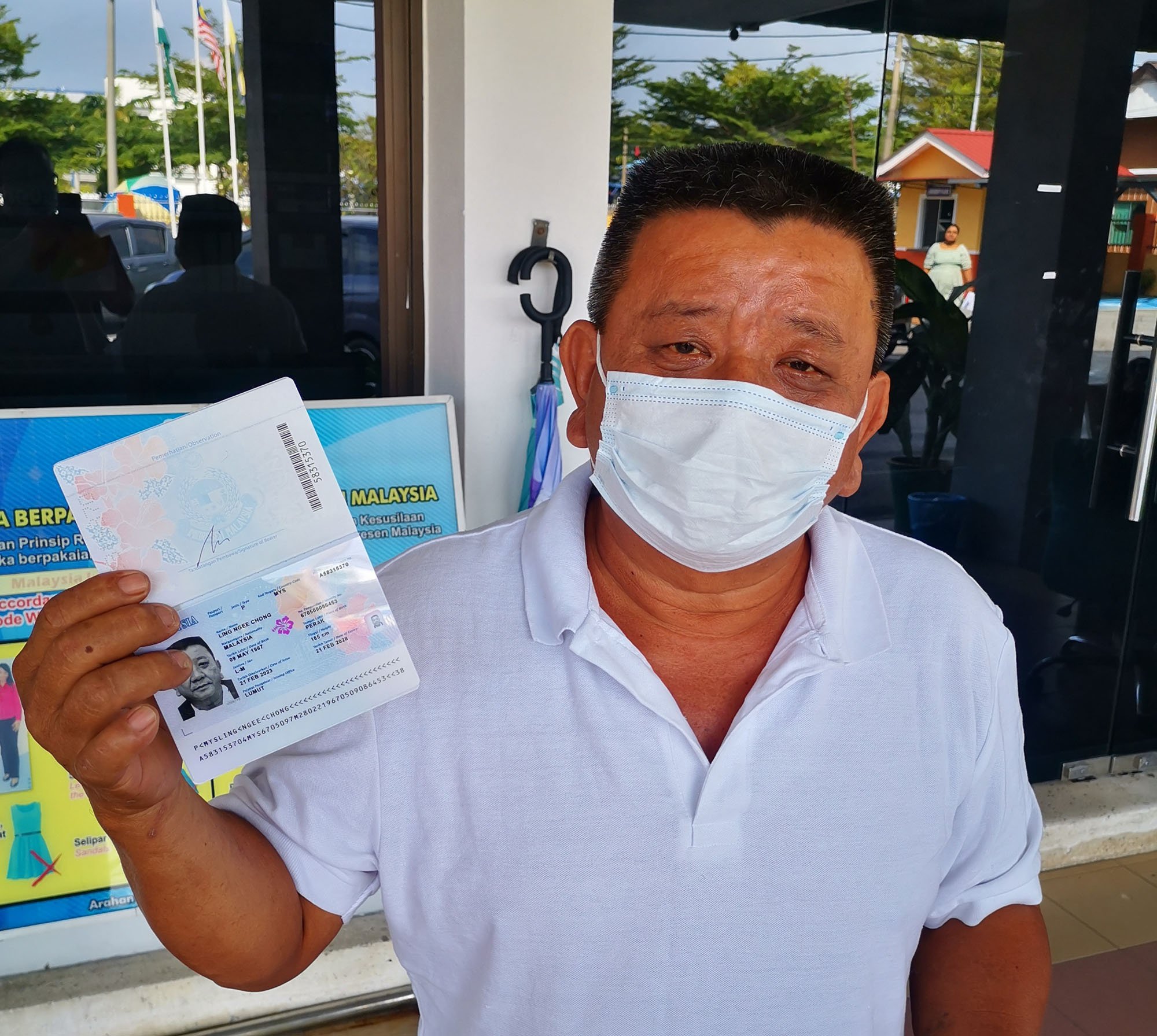 霹:第三版头/记者亲身体验 4小时内成功领取新护照