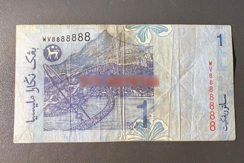  RM1000买RM1纸钞不嫌贵 男：太爱这组号码了！