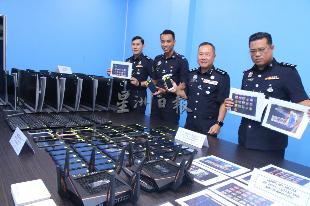 冼都警方突击甲洞公寓 抓获21名涉赌人员