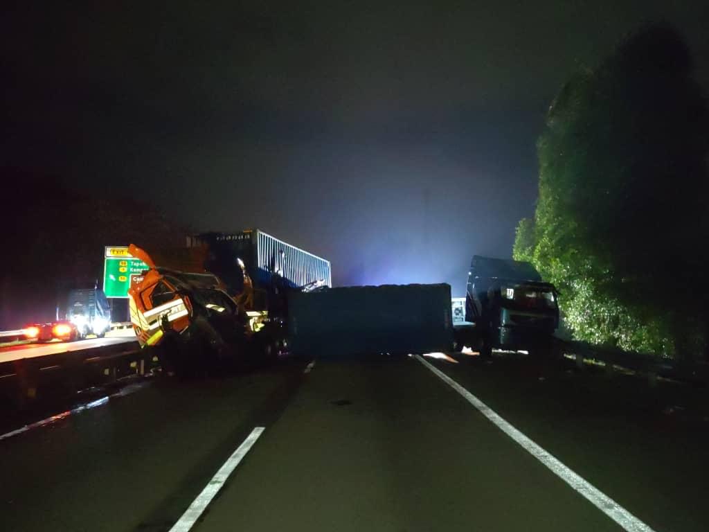 拖格罗厘停大道紧急道 另一罗里闪避不及撞上
