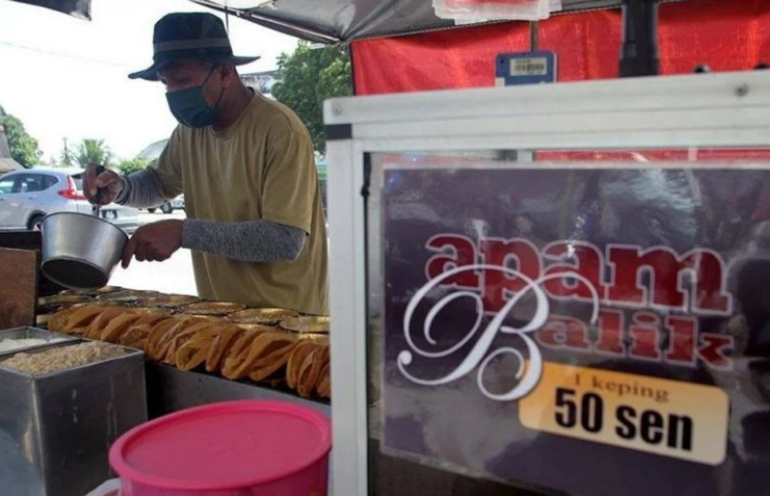 曼煎糕只卖50仙25年来不起价!小贩:赚不多但养得起6儿 已知足