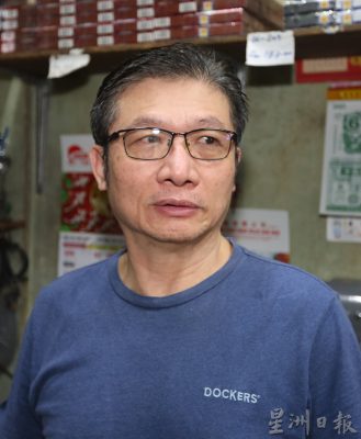 柔:封面:哥打丁宜水灾后市区恢复生活秩序