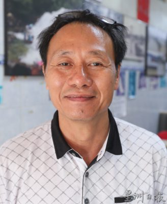 柔:封面:哥打丁宜水灾后市区恢复生活秩序