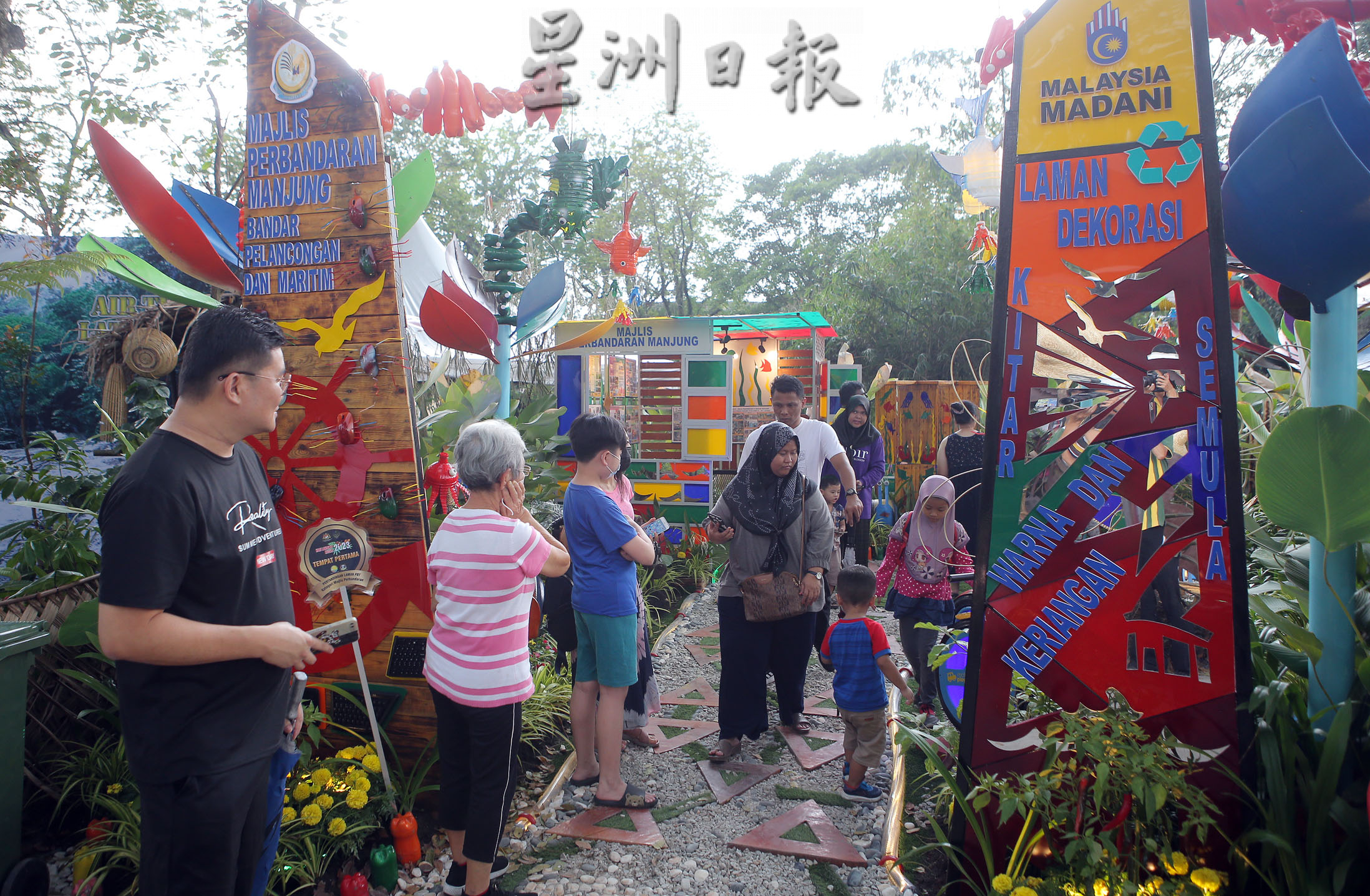 霹：版头／集花卉植物造景 推广观光文化古迹 曼绒金宝夺景观赛冠军