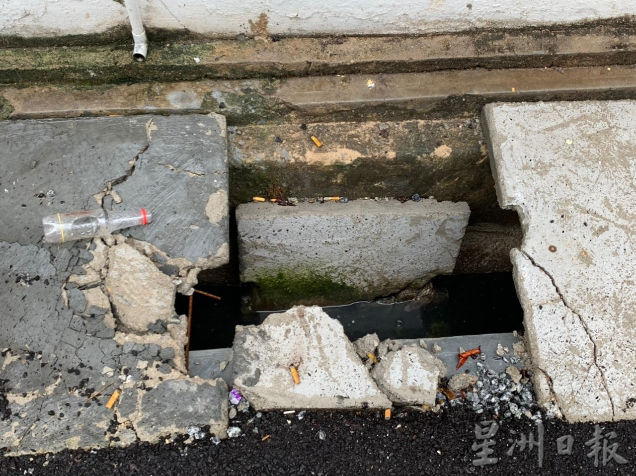 (古城版)疑工程偷工减料 小巷沟盖竣工两个月即破损