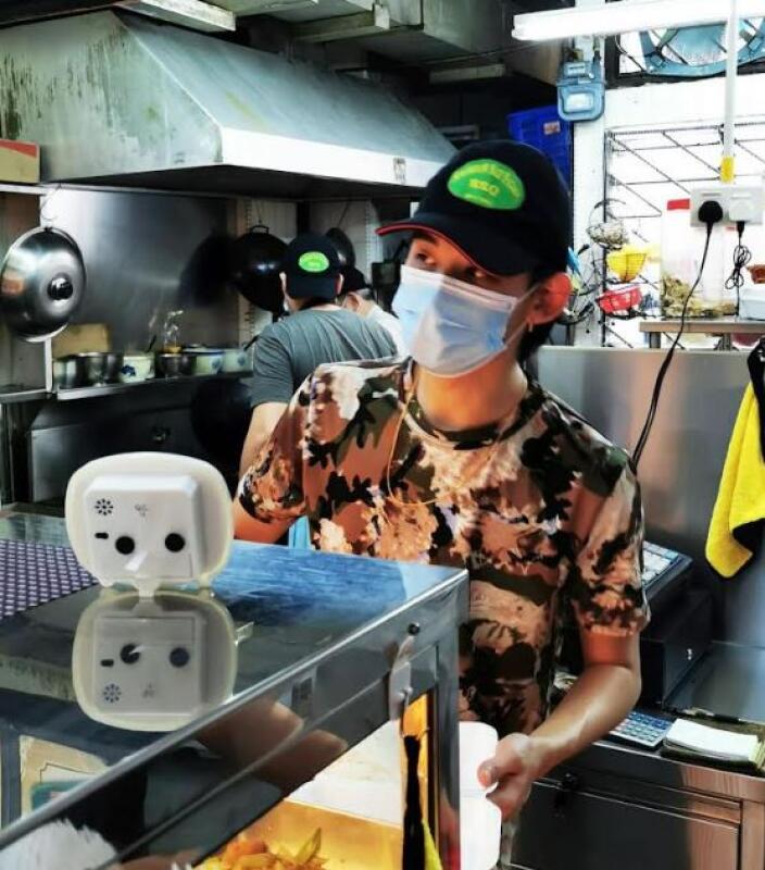 (已签发)柔:狮城二三事:用拼音学华语 帅哥小贩变歌手