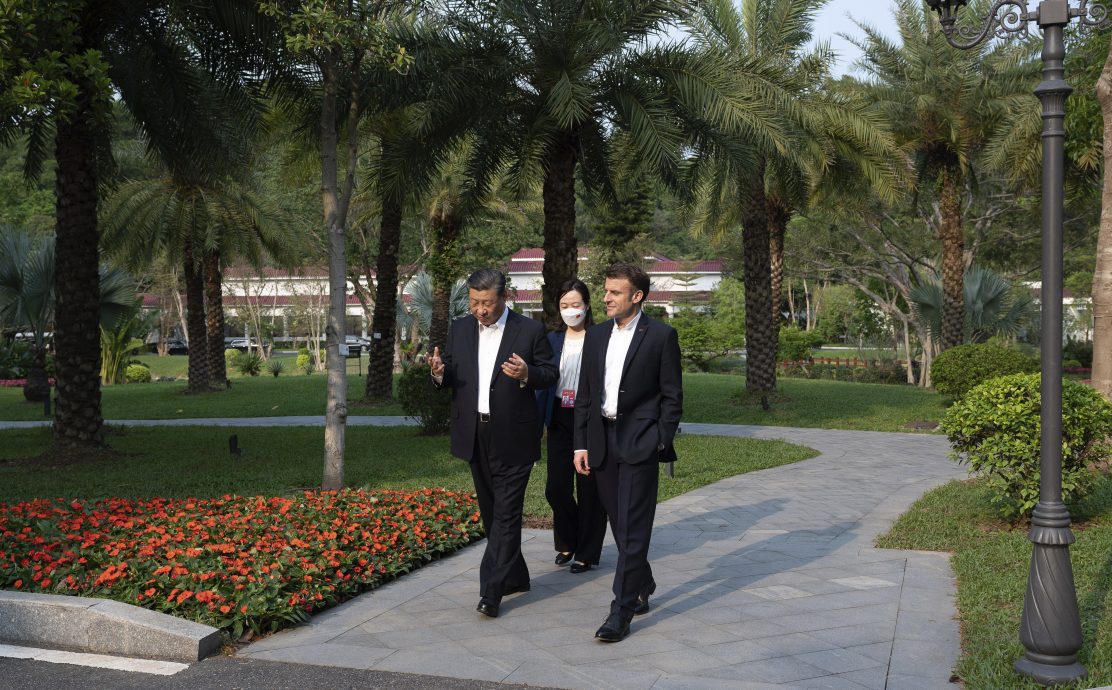 习近平专赴广州再会马克龙  漫步庭园兼品茶 