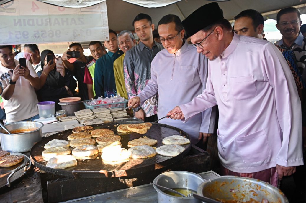 全：安华访瓜登开斋活动