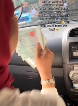 女子用餐后喜获横财! 获陌生男送RM250青包钱