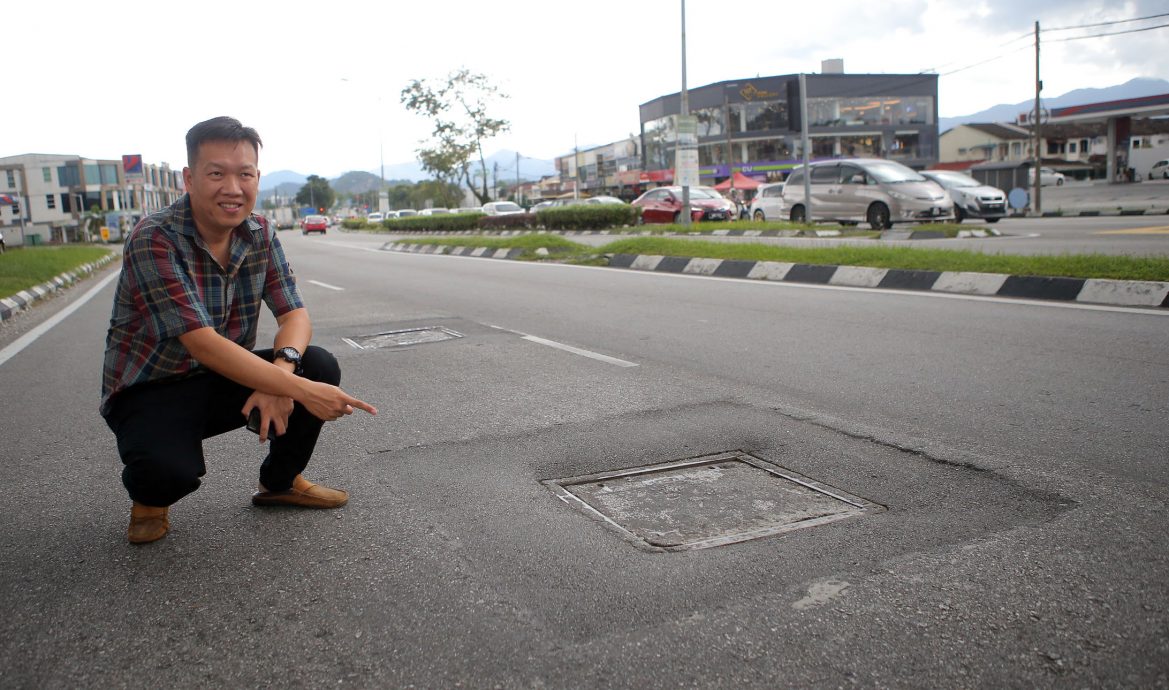 巴占大路暗涵洞口和路面不平 摩托车骑士翻车重伤