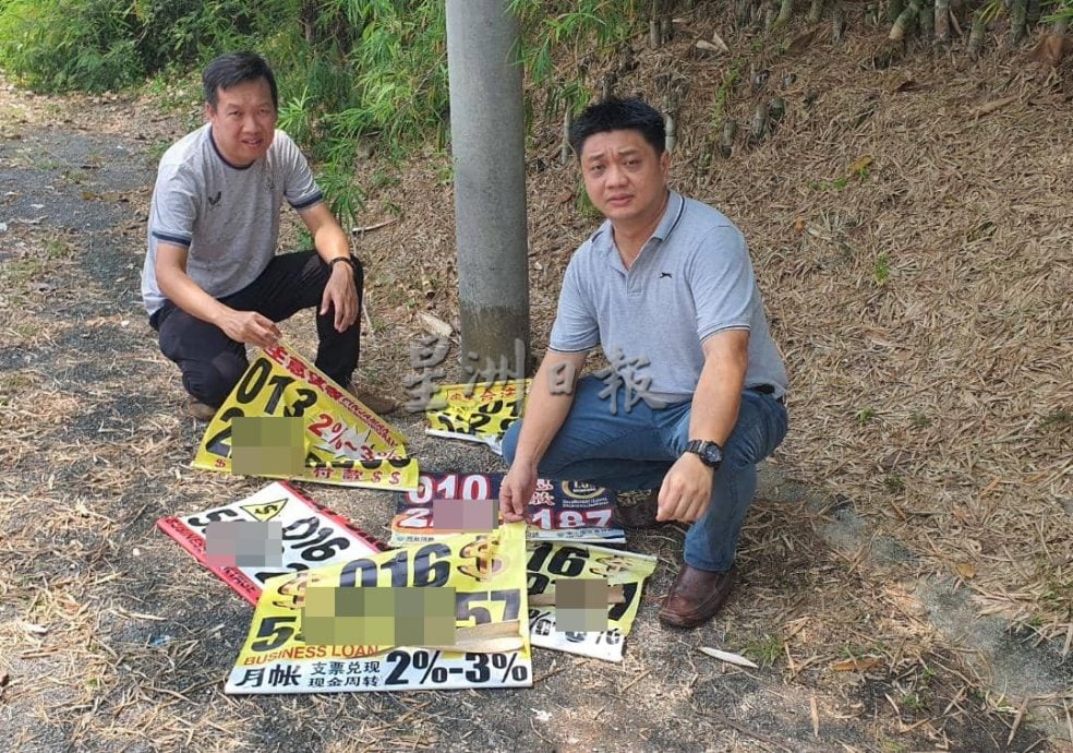 怡首3月拆3万张 阿窿横幅高挂 执法员昂头持镰刀割下
