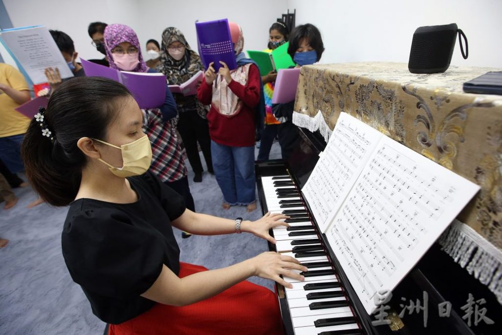 新教育（4月11日）封面故事：大马自闭症协会合唱团[摄影组] 黄安健