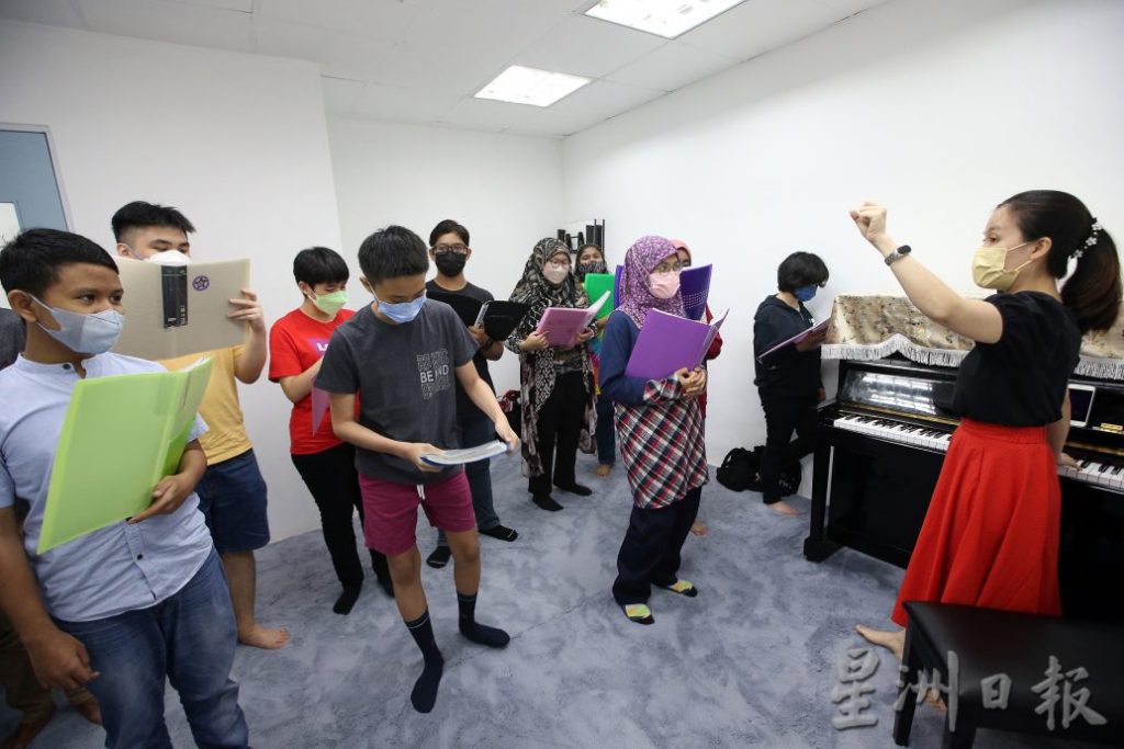 新教育（4月11日）封面故事：大马自闭症协会合唱团[摄影组] 黄安健