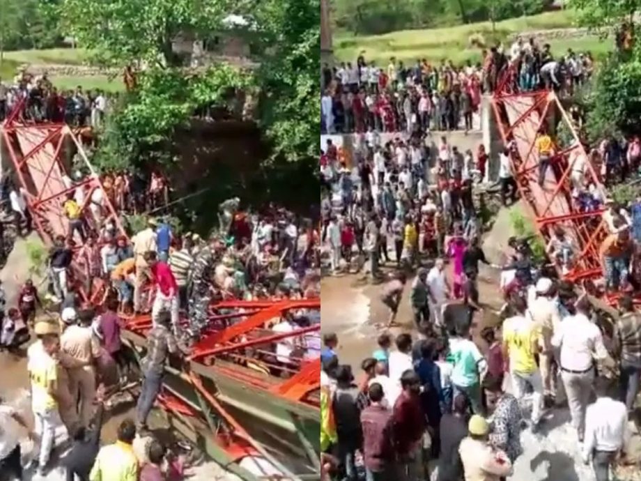 百人疯挤上桥庆节日 桥塌坠河1死64伤