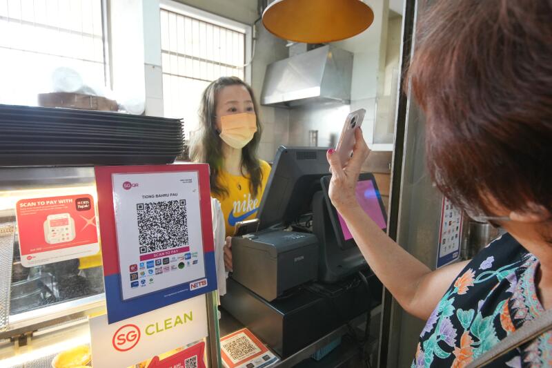 (已签发)柔:狮城二三事:狮城可用Touch 'n Go付款 用户少使用 摊贩多不知