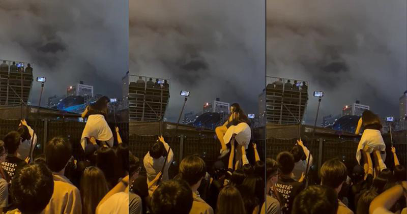 周董港开唱场外挤爆 粉丝爬墙包游艇超疯狂