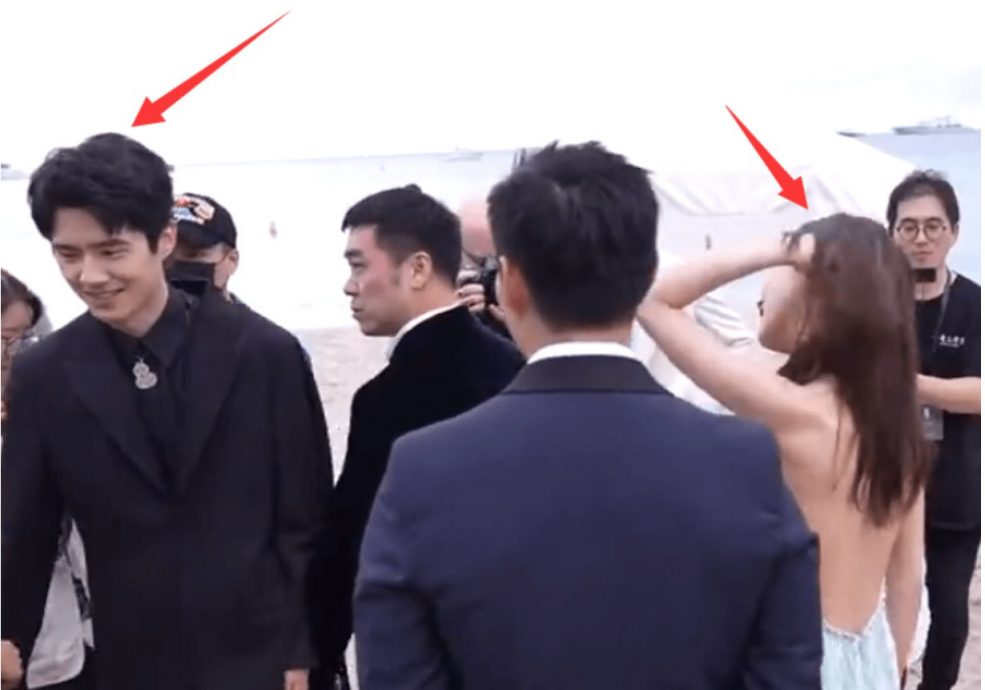 康城影展｜曝恋情后首度同框 周冬雨歪头偷看刘昊然