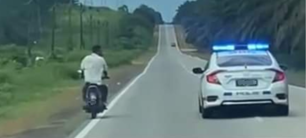 未戴头盔拒检逃逸 警方追逐摩托车骑士