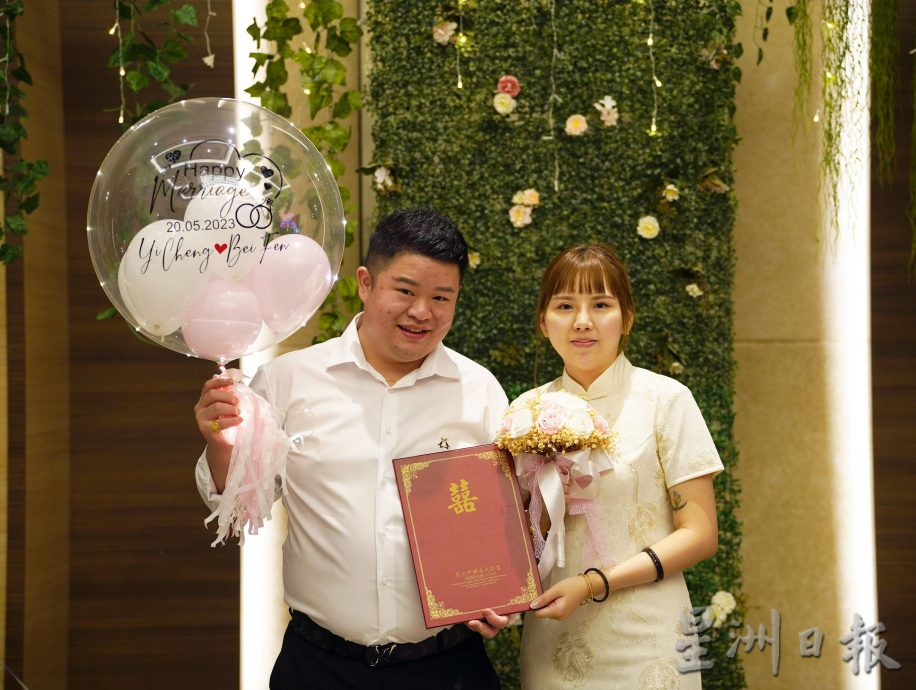 (古城封底主文)兴安天后宫婚姻注册局“520”23对新人共结连理