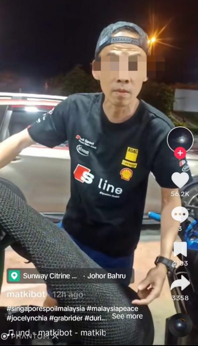 视频|疑狮城男提桶越堤装油 送餐员当场揭发起冲突