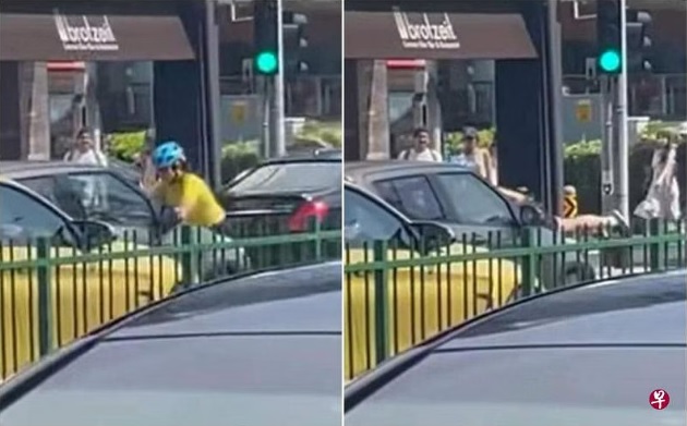 (已签发)柔:狮城二三事:东海岸路惊险一幕 脚踏车女骑士肉身挡车