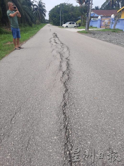 **已签发**柔:第二版头条:【民生特工队】:全长2公里却多处龟裂下陷,居民盼当局尽速维修道路