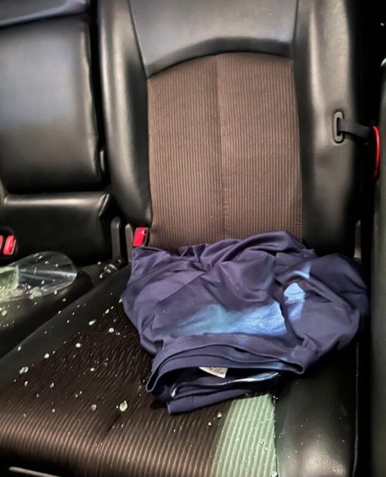 (已签发)柔:狮城二三事:狮城客游新山餐厅外‘看着’ 车窗仍被匪砸