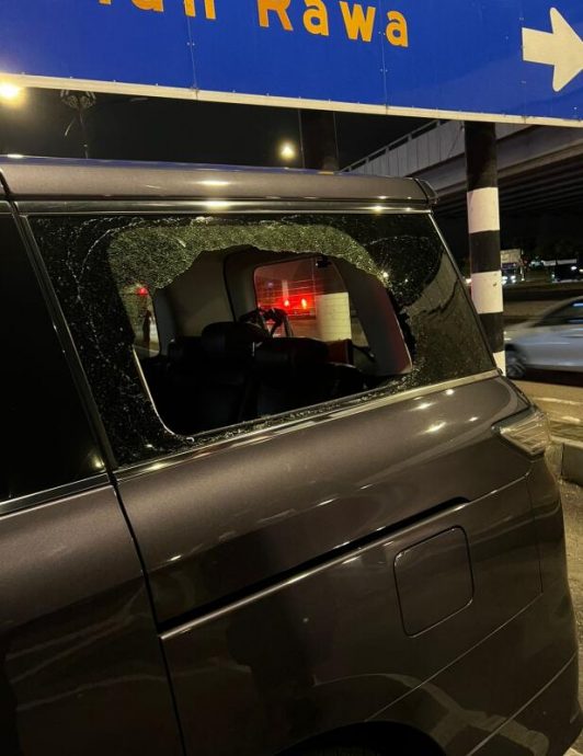 (已签发)柔:狮城二三事:狮城客游新山餐厅外‘看着’ 车窗仍被匪砸