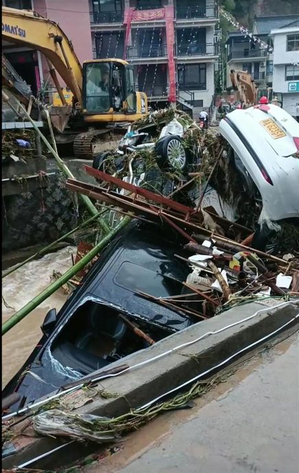 杭州突降暴雨引发洪水酿5死 辽宁疏散逾2400人