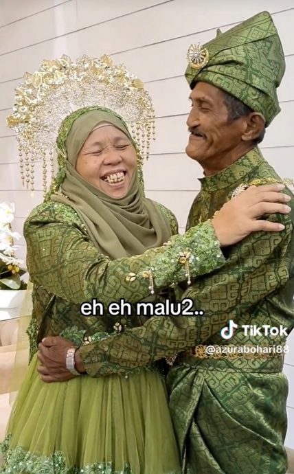 视频|即兴试穿礼服兼拍婚照 年迈夫妻闪瞎网民