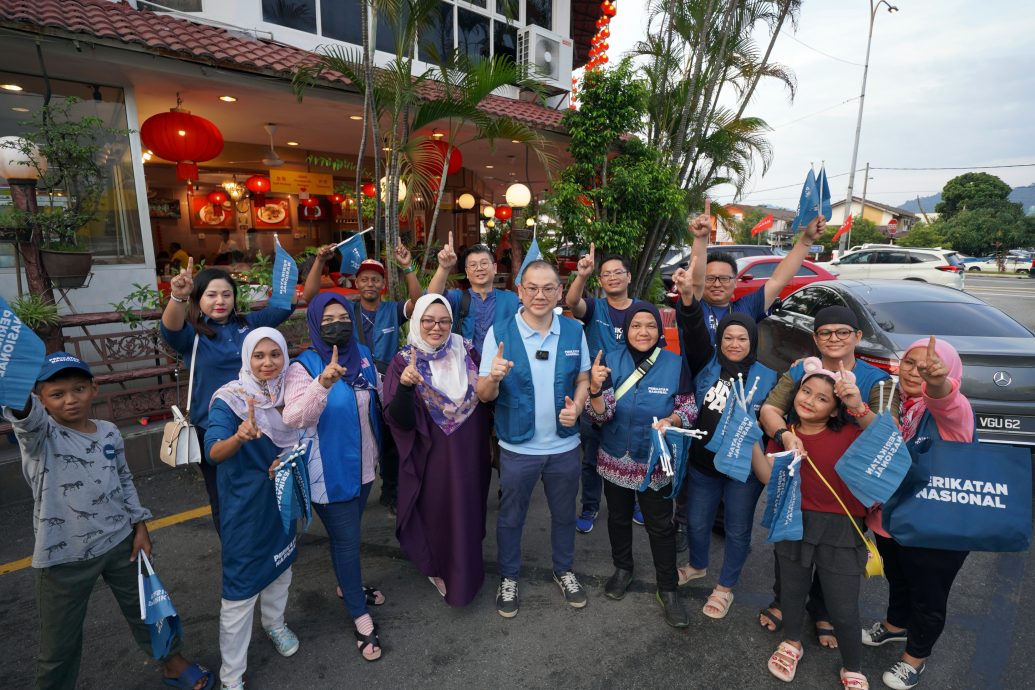 大都会/副文／周汉旗暂自费参与竞选／5图