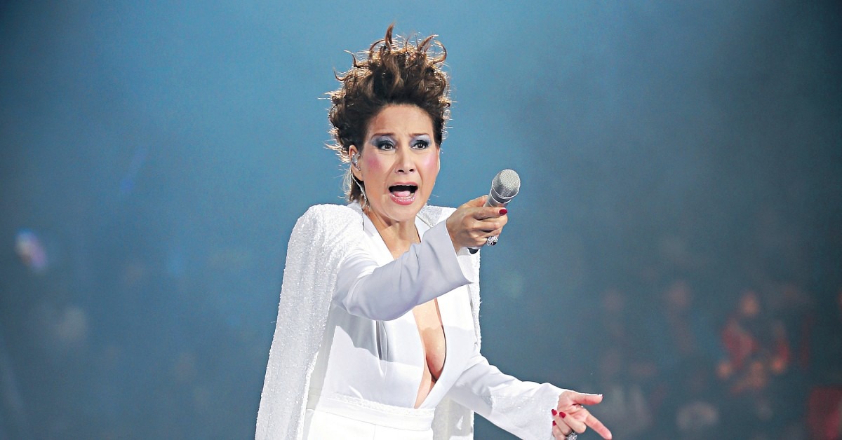 甄妮连日狂轰《中国好声音》 获知停播哭喊:正义之声万岁