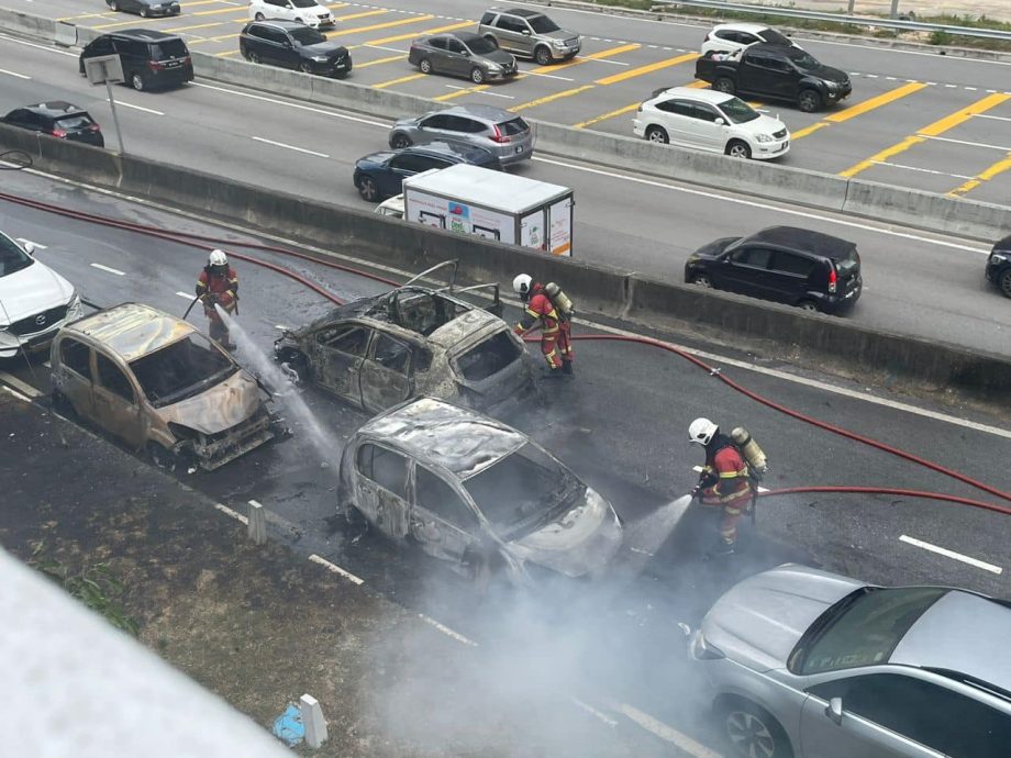 试驾车路上起火自燃波及4车·顾客职员吓坏忙逃命