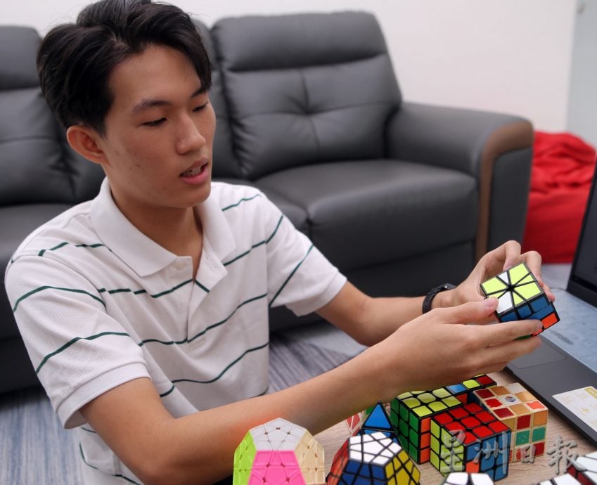 霹:31日见报/乐活频道 | 乱中有序 解析魔方斗智斗速