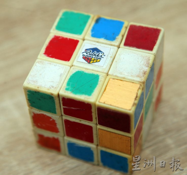 霹:31日见报/乐活频道 | 乱中有序 解析魔方斗智斗速