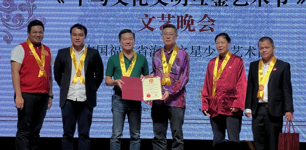 (古城封底版主文)以中华文化艺术交流为纽带·杨焕源:加深中马友谊