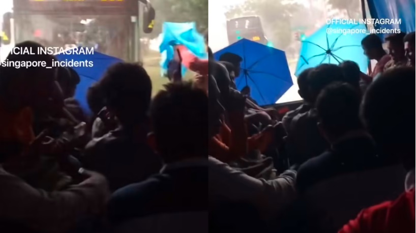 (已签发)柔:狮城二三事:客工罗里上开伞避大雨 罗里载客工课题再掀讨论
