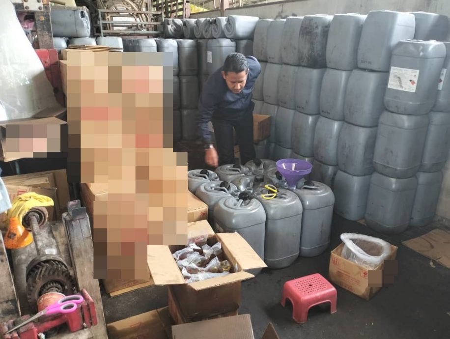 巴西富地一家罗里修理厂背地里进行走私津贴食油的不法勾当。