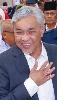 政党人士部析:阿末扎希案影响选情各有解读