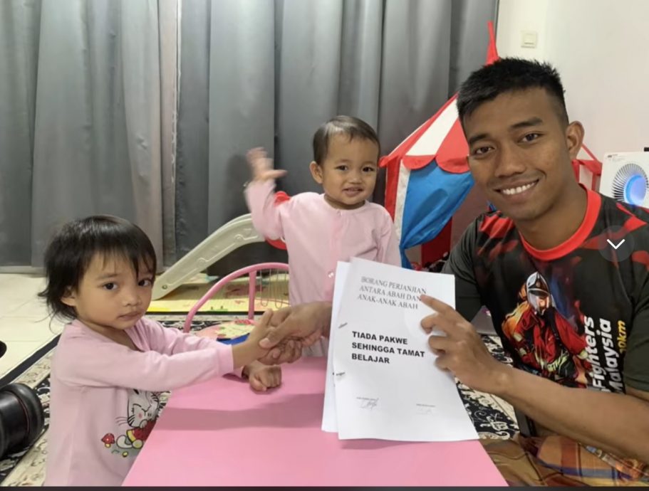 视频|父与2女签协议 “大学毕业前不可交男友”