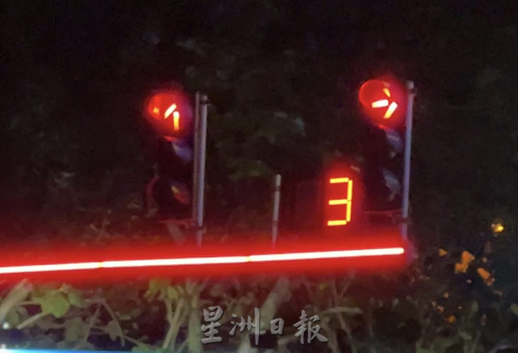 （古城封面主文）交通灯披LED新装随着变色·公众别再闯红灯了