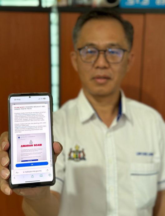 (古城第三版主文)诈骗集团发“罚单电邮” 刘志俍促切勿上当