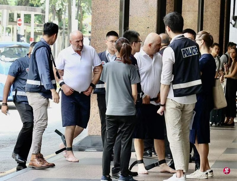 (已签发)柔:狮城二三事:两男伪钞换真钞 骗兑换商7万美元