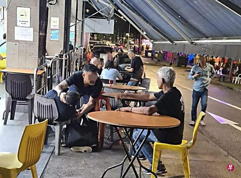(已签发)柔:狮城二三事:咖啡店打人被阻 男子称“误会”