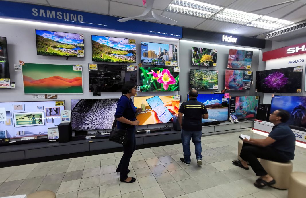 国庆月促销活动有助催谷买气,惟消费者购买能力趋降