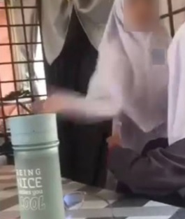 不满个人照被放上网 女中学生扇同学5巴掌